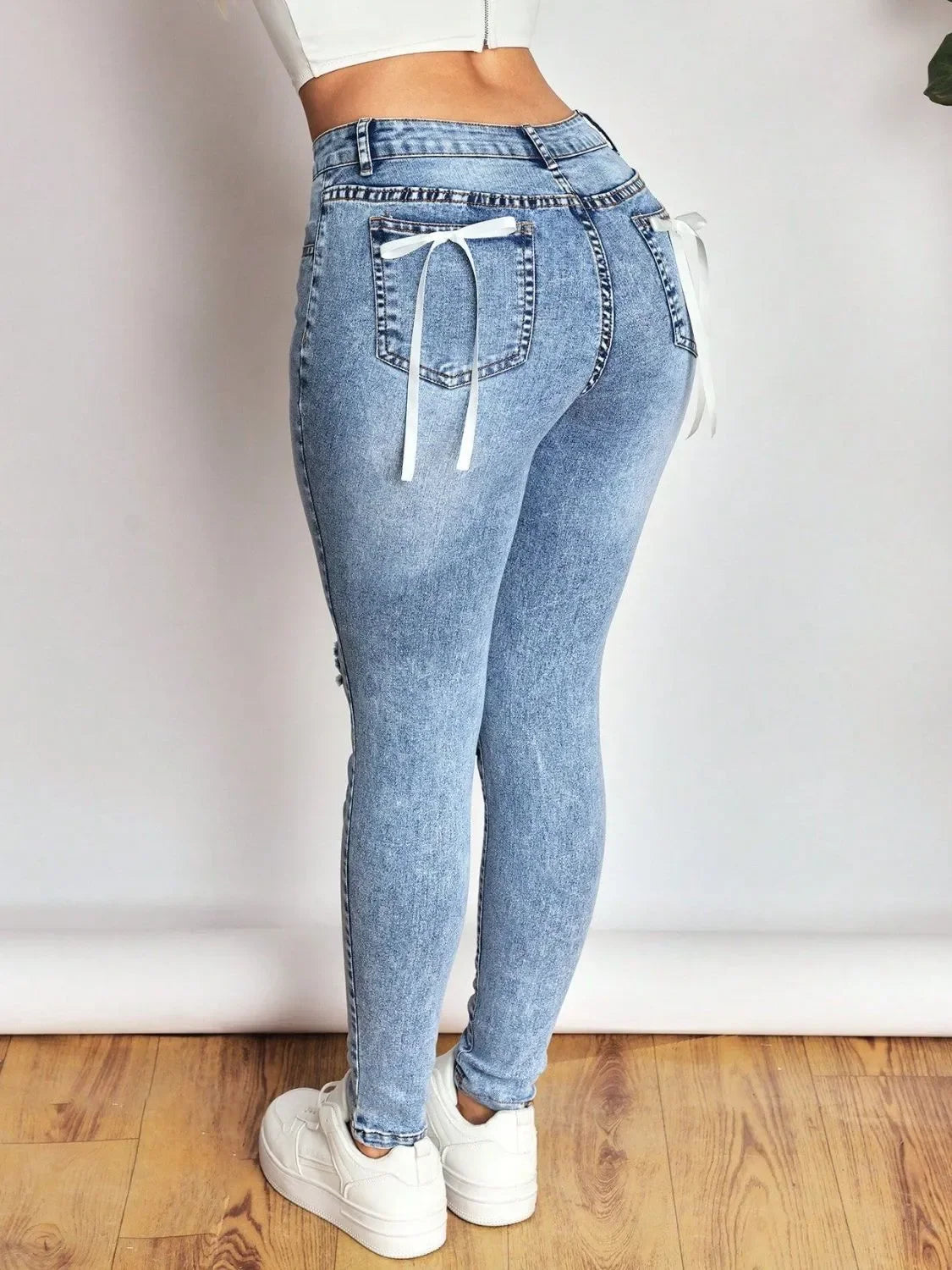 Distressed Skinny Jeans with Bow Back - tif-shop24.de