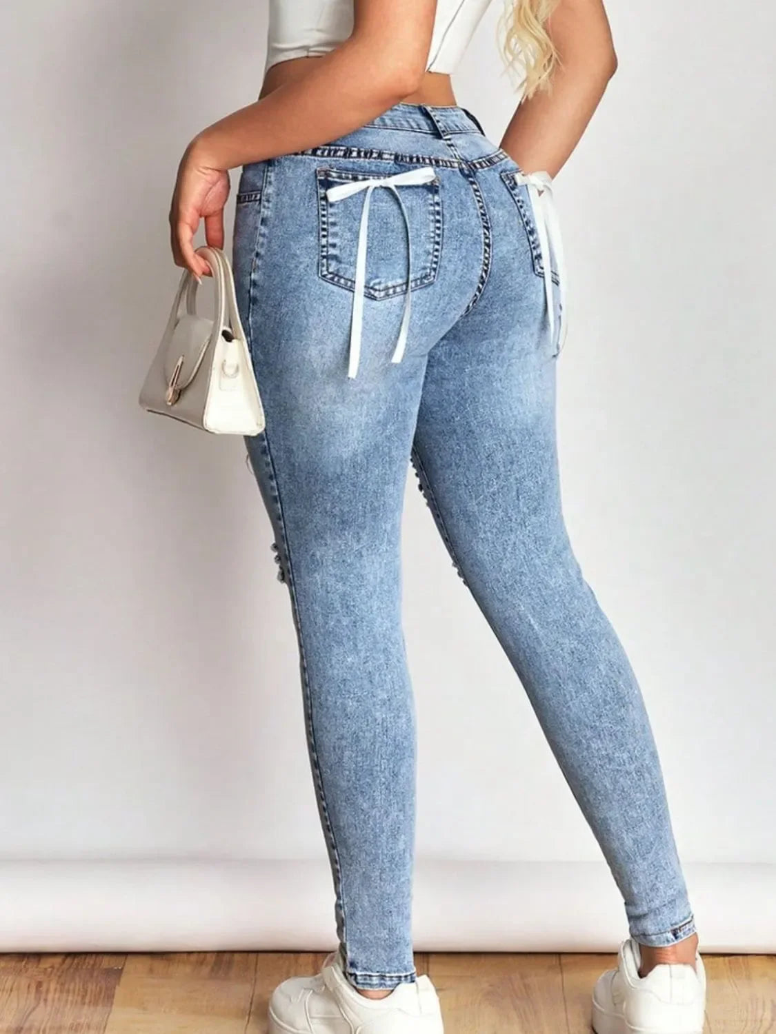 Distressed Skinny Jeans with Bow Back - tif-shop24.de