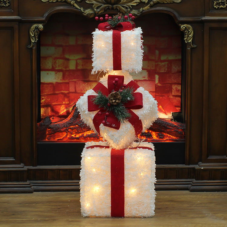 Weihnachtsschmuck mit Lichtern, die weiß leuchten, dreiteilige Geschenkbox, die vertikale Geschenktüten-Szenendekoration