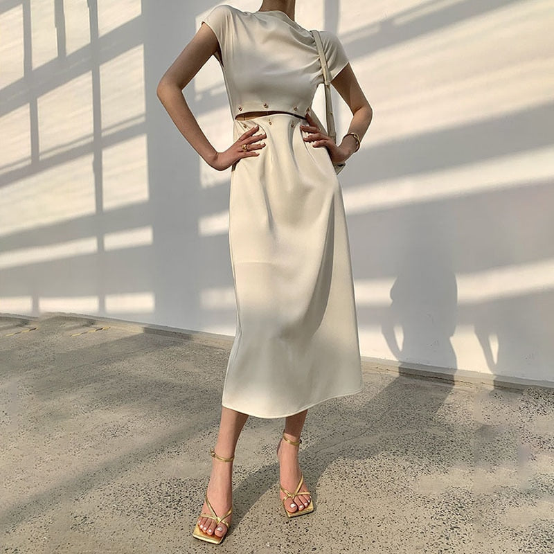 TWOTWINSTYLE Elegant White Long Dress Female Round Neck Short Sleeve High Waist Cut Out Midi Clothing